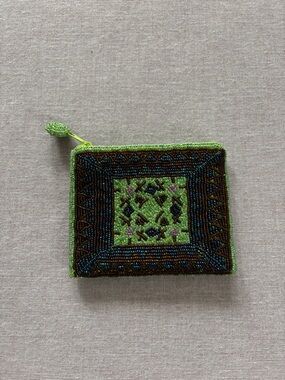 Green beaded coin purse.
